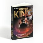 Auf dem Cover steht: "Heyne, Stephen King, Schwarz, Der Dunkle Turm, Roman." Ein Revolverheld in schwarz-weißem Ton.
