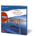 Text: "Gil Ribeiro Gegen die Zeit Lost in Fuseta. Ein Portugal-Krimi. argon hörbuch." Bild: Boot auf ruhigem Wasser vor beleuchteter Stadt.