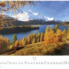 Engadin, Silsersee. Kalenderdatum orientiert an November. Herbstlandschaft mit goldenen Lärchen, See und schneebedeckte Berge.