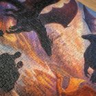 Illustration eines Puzzles mit zwei Drachen in einer dramatischen, feurigen Landschaft.