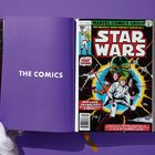 Links steht „THE COMICS“. Rechts das Cover eines Star Wars-Comics mit Luke Skywalker in Kampfszene.