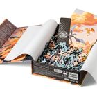 "Joris Halgand", "ONYX STORM" und ein offenes Puzzle mit Drachenillustration in einer Landschaft aus Wolken.