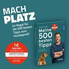 "MACH PLATZ im Regal für die 500 besten Tipps vom Hundeprofi!" Buchcover mit Mann, Hund und rotem Spendehinweis.