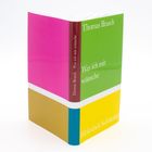 Ein Buch zeigt den Titel "Was ich mir wünsche" von Thomas Brasch. Es hat eine bunte, mehrfarbige Covergestaltung.