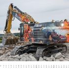 "KELLNER Baggern ohne Grenzen, CATERPILLAR." Ein bunt gestalteter Bagger auf einer Baustelle mit Steinen. Unten steht "FEBRUAR".