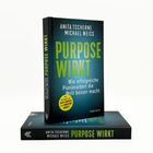 Der Text zeigt den Buchtitel "Purpose Wirkt" von Anita Tscherne und Michael Weiss. Cover mit blauem Hintergrund.