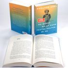 Zwei Bücher und eine offene Seite. Text: "ZWÖLF". Titel: "DU MUSST MEINE HAND FESTER HALTEN, NR. 104" von SUSANNE ABEL.