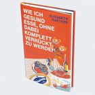 Ein orangefarbenes Buchcover mit dem Titel "Wie ich gesund esse, ohne dabei komplett verrückt zu werden".