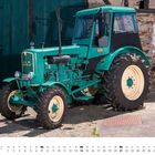 Text: "März", "MAN Ackerdiesel 4R2". Ein grüner, klassischer Traktor steht vor einer alten Steinwand.
