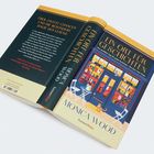 Buchtitel: "Ein Ort für Geschichten" von Monica Wood, mit Illustrationen eines bunten Büchergeschäfts.