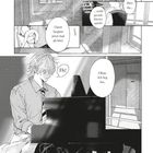 Eine Manga-Seite: Eine Person spielt Klavier, während Andere neugierig lauscht. Text: "Wer da..." "Okay. Ich leg los."