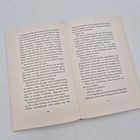 Eine aufgeschlagene Buchseite mit fortlaufendem Text auf den Seiten 90 und 91.