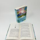 Der Titel "Töchter des Himalaya" ist sichtbar. Ein aufgeschlagenes Buch daneben zeigt Seitenzahlen 188 und 189.