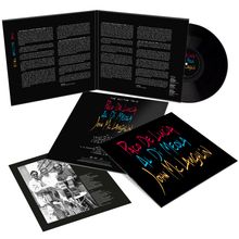 "The Guitar Trio" und Namen in bunter Handschrift. Schwarzes Vinyl, offene Albumhülle, Foto von drei Gitarristen.