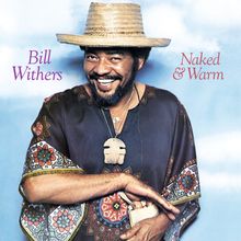 "Bill Withers" und "Naked & Warm" stehen oben. Ein Mann mit Strohhut lächelt im bunten, gemusterten Gewand vor blauem Himmel.