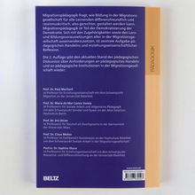 Text über Migrationspädagogik und Bildungsfragen. Autoren: Prof. Mecheril, Castro Varela, Dirim, Melter, Shure. Orangener Rand. BELTZ.