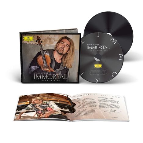 CD-Hülle mit "David Garrett IMMORTAL ONYX EDITION", daneben Booklet mit Bild eines Mannes mit Geige.