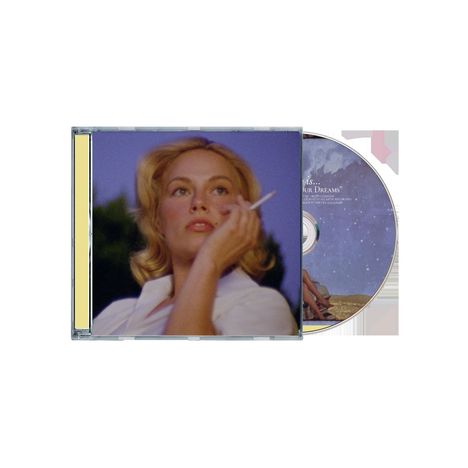 Auf der CD steht: "OUR DREAMS". Eine Frau mit blonden Haaren hält eine Zigarette, Hintergrund in dunklen Farben.