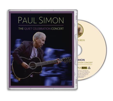 „PAUL SIMON The Quiet Celebration Concert“ auf Blu-ray-Cover und Disc mit holografischem Hintergrund.