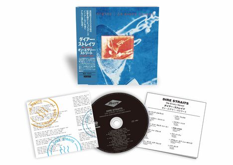 "DIRE STRAITS On Every Street" CD-Packung mit blauem und rotem Design, Booklet und Trackliste. Japanische Schriftzeichen.