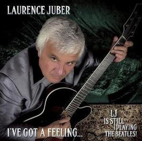 "LAURENCE JUBER", "I'VE GOT A FEELING...", "LJ IS STILL PLAYING THE BEATLES". Ein Mann spielt eine Gitarre.