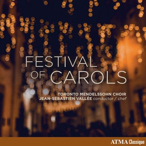 "FESTIVAL OF CAROLS, Toronto Mendelssohn Choir, Jean-Sébastien Vallée conductor. Verschwommene Lichter im Hintergrund."