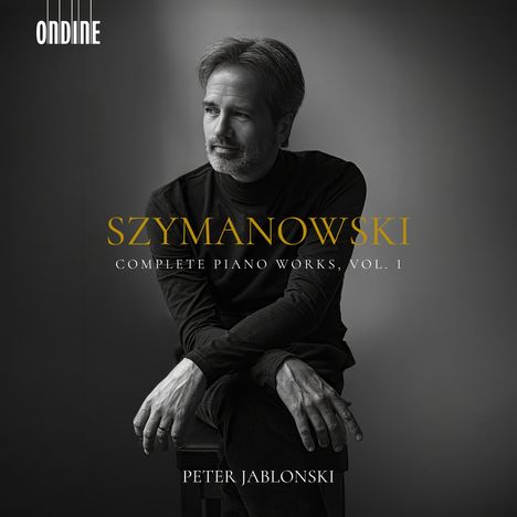 "SZYMANOWSKI COMPLETE PIANO WORKS, VOL. 1 PETER JABLONSKI." Schwarz-weiß Porträt eines nachdenklichen Mannes im Pullover.