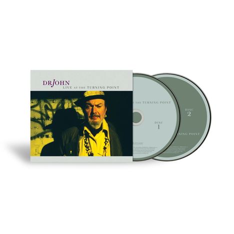 „Dr. John Live at the Turning Point“. Zwei CDs mit einem Coverbild eines Mannes vor einer Wand mit Graffiti.