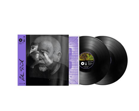 Text: "Dark-Side Mixes", "Peter Gabriel". Das Bild zeigt ein Albumcover mit einem Porträt eines Mannes und zwei Schallplatten.