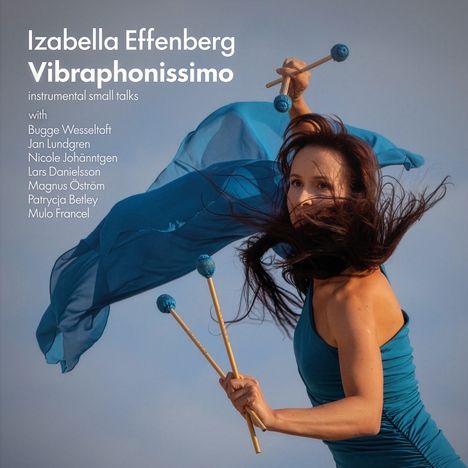 Text: "Izabella Effenberg Vibraphonissimo, instrumental small talks, with Bugge Wesseltoft, Jan Lundgren, Nicole Johänntgen."  
Eine Frau in blauem Kleid schwingt Tuch und Schlegel.