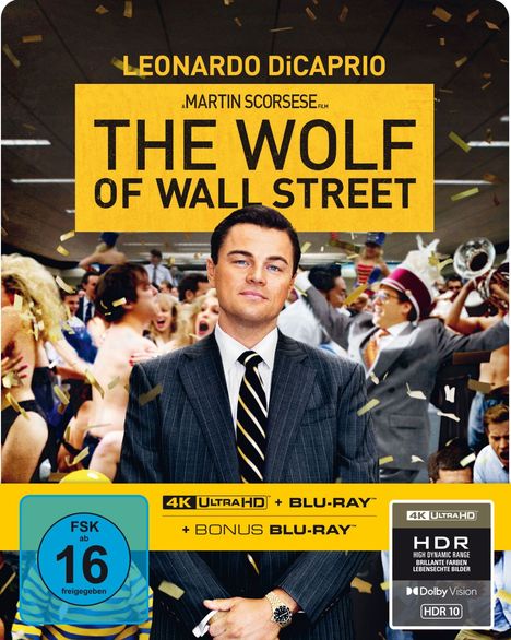 "The Wolf of Wall Street" in gelbem Kasten. Mann im Anzug, Party-Szene im Hintergrund. 4K Blu-ray Angaben. FSK 16.