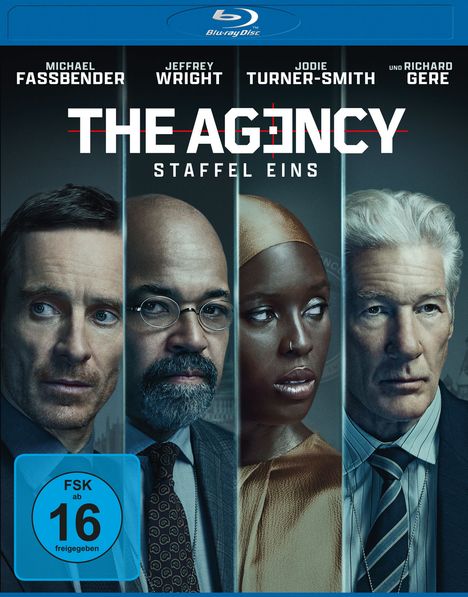 "The Agency: Staffel Eins", Blu-ray Hülle mit vier ernsten Personen. Text: Michael Fassbender, Jeffrey Wright, Jodie Turner-Smith, Richard Gere.