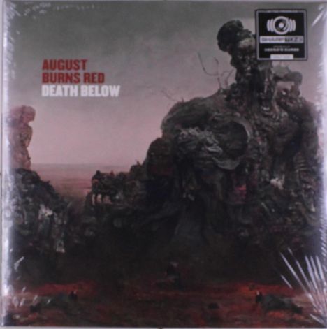 Texte: "AUGUST BURNS RED" und "DEATH BELOW". Eine düstere Landschaft mit zerklüfteten Bergen und bedrohlichem Himmel.