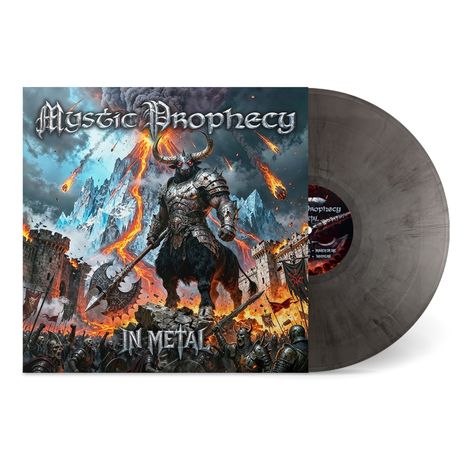„Mystic Prophecy“ und „In Metal“ in gotischer Schrift. Eine Illustration zeigt einen Krieger vor brennender Festung.