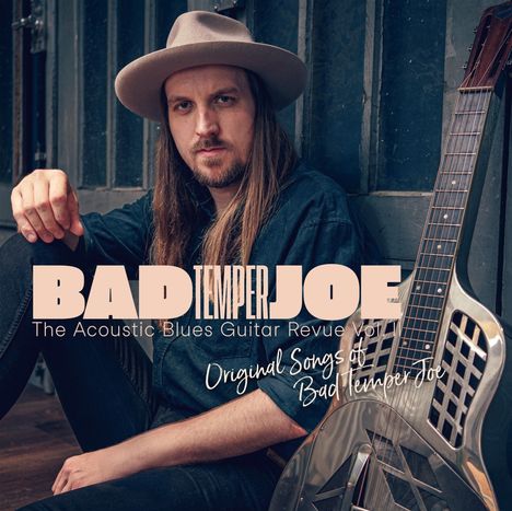 Texte: "BAD TEMPER JOE", "The Acoustic Blues Guitar Revue Vol 1", "Original Songs of Bad Temper Joe". Mann mit Hut neben Gitarre.