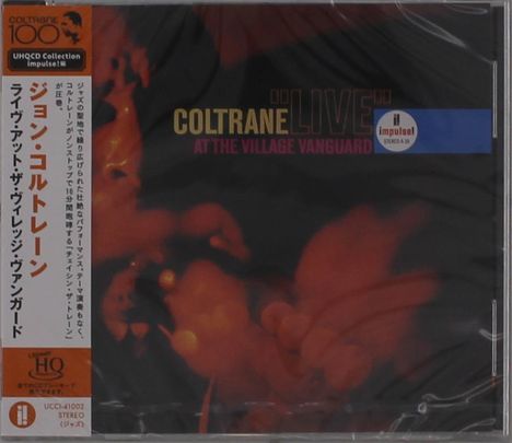Text: "Coltrane 'Live' at the Village Vanguard." Dunkles Cover, warme Rottöne, Porträt eines Musikers, Logo oben rechts.