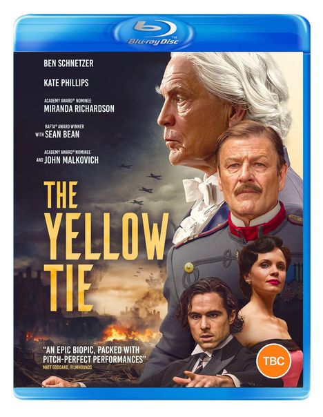 Texte: "THE YELLOW TIE," Darstellernamen, Zitat über den Film. Szenerie: Menschen in eleganter Kleidung vor brennender Kulisse.