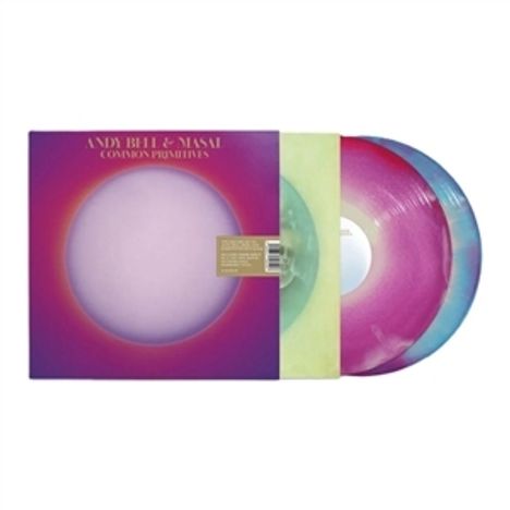Der Text lautet "Andy Bell & Masal - Tidal Love Numbers". Zwei bunte Vinylplatten, die ineinander gesteckt sind.