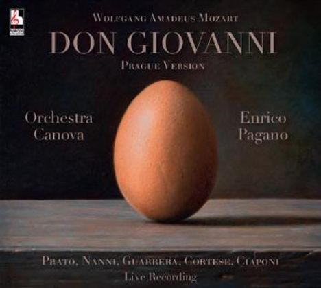 „Don Giovanni, Prague Version“ steht groß. Darunter ein braunes Ei auf einem Tisch. Orchester: Canova, Dirigent: Enrico Pagano.