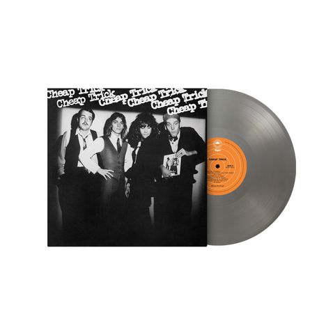 "Cheap Trick" erscheint mehrfach oben. Vier Leute posieren schwarz-weiß. Eine graue Schallplatte ist rechts zu sehen.