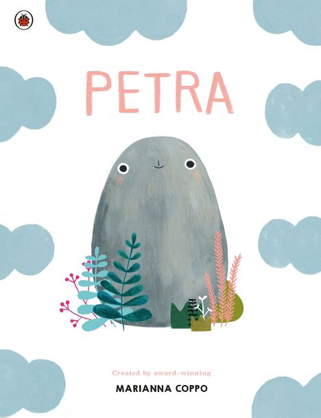 „PETRA“ steht oben, darunter eine Illustration: ein grauer Stein mit minimalem Gesicht, umgeben von bunten Pflanzen.