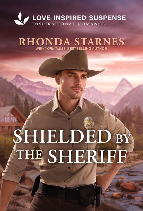 Text: "LOVE INSPIRED SUSPENSE", "RHONDA STARNES", "SHIELDED BY THE SHERIFF". Sheriff im Cowboy-Hut vor Berglandschaft.