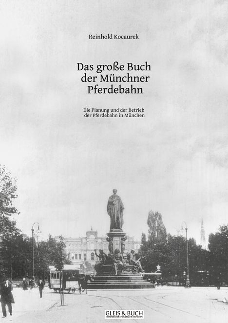 „Das große Buch der Münchner Pferdebahn“. Schwarz-weiß Foto eines Denkmals auf einem belebten Platz mit Bäumen.
