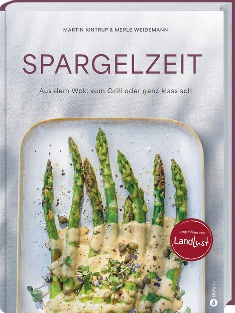 "Spargelzeit. Aus dem Wok, vom Grill oder ganz klassisch." Asparagus mit Sauce und Kräutern dekoriert.