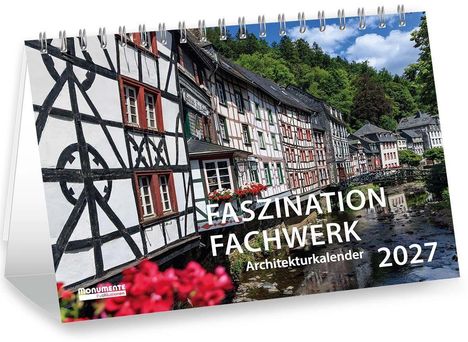 "Faszination Fachwerk Architekturkalender 2027." Fachwerkhäuser an einem Fluss, umgeben von grünen Bäumen und Blumen.