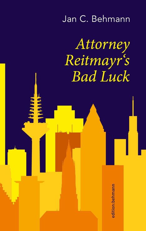 "Jan C. Behmann - Attorney Reitmayr's Bad Luck." Skyline aus gelben und orangen Gebäuden vor dunklem Hintergrund.