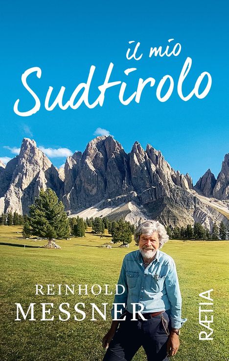 Text: "il mio Sudtirolo, Reinhold Messner, RAETIA". 

Ein lächelnder Mann vor einer beeindruckenden Berglandschaft.