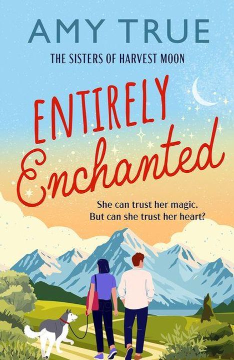 "Entirely Enchanted" in roter Schrift. Zwei Menschen und ein Hund spazieren in einer Berglandschaft. Mond und Sterne am Himmel.