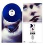 Text: "GET MEAN". Blaues Vinyl, unscharfe Gesichter, ein Auge in Nahaufnahme.