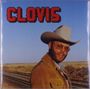 "Clovis" in roten Buchstaben. Ein Mann mit Cowboyhut und Sonnenbrille steht in einer weiten Landschaft.